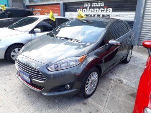 Ford Fiesta 2015 usado a la venta en El Salvador ¡¡A LA VENTA FORD FIESTA 2015!! -Cilindraje: 1600cc -Kilometraje: 15 mil millas -Automatico. -Rines Especiales. -Camara de retroceso. -Sensores de impacto. -Pantalla.