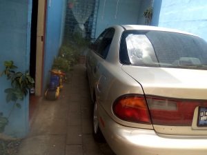 Mazda Protege 1998 usado ubicado en El Salvador DETALLES: SOPORTE DE MOTOR NO TIENE CD PLAYER NECESITA AFINADO MENOR Y MAYOR