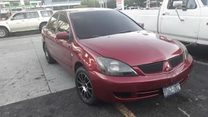 Mitsubishi Lancer 2006 Lancer 2006 cuatro puertas rines especiales luces xenón, Aire acondicionado en perfecto estado, paquete eléctrico, Alarma, Standar, motor a toda prueba. info al. 79298697